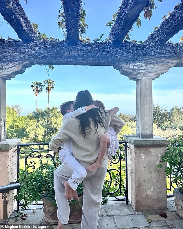 Meghan shares a new picture of Archie and Lilibet as she celebrates Mother’s Day in the US: ‘Cheers to juggling it all with joy!’